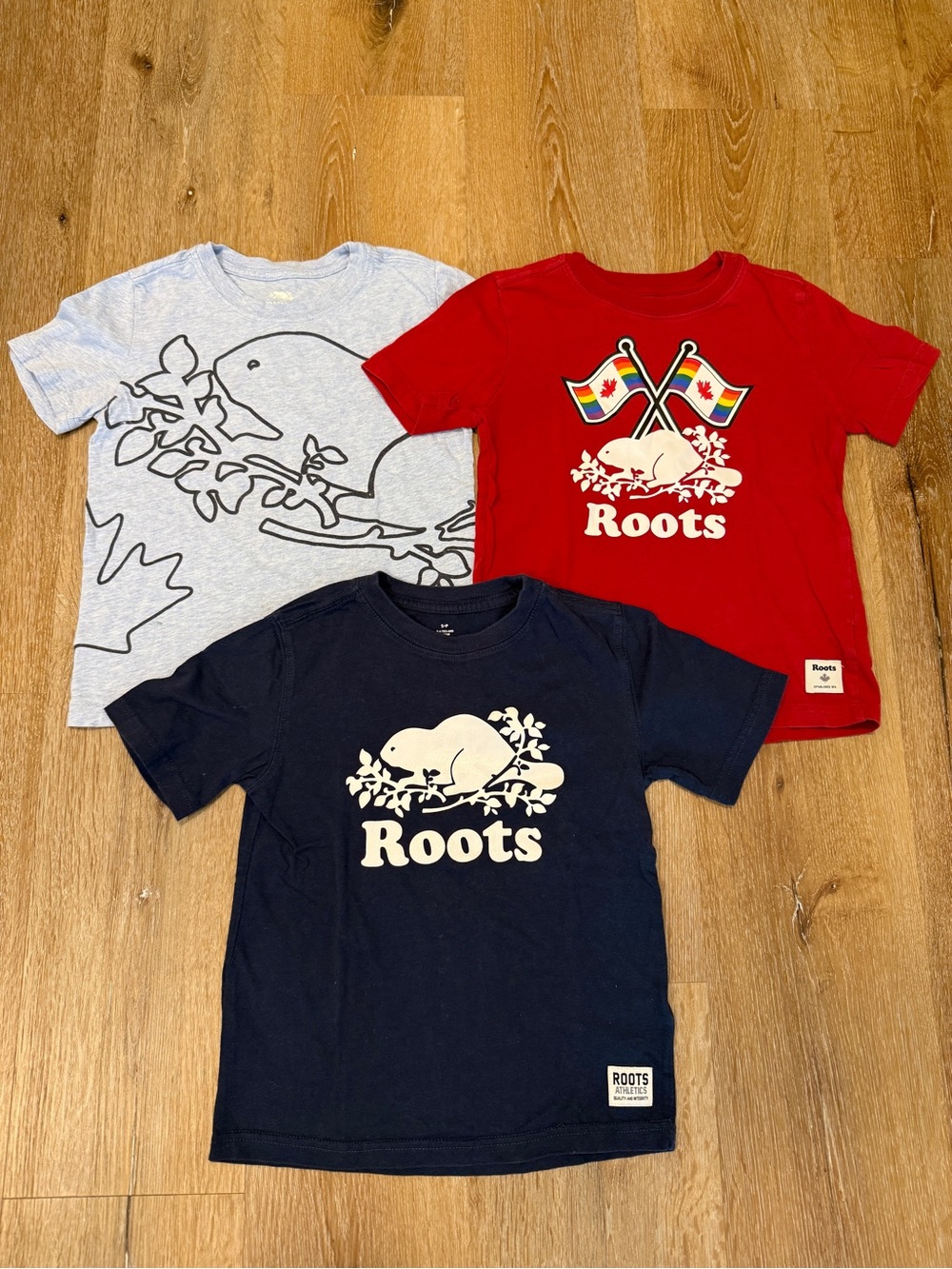 Roots Kids' Short Sleeve Tee, Navy, Red, Light Blue. Size 6 or Small. Price all.